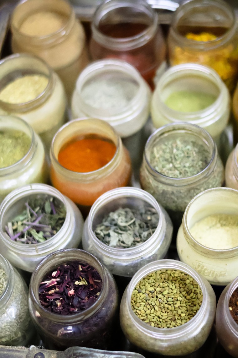 Colourful spices and herbs in jars at a Cairo market