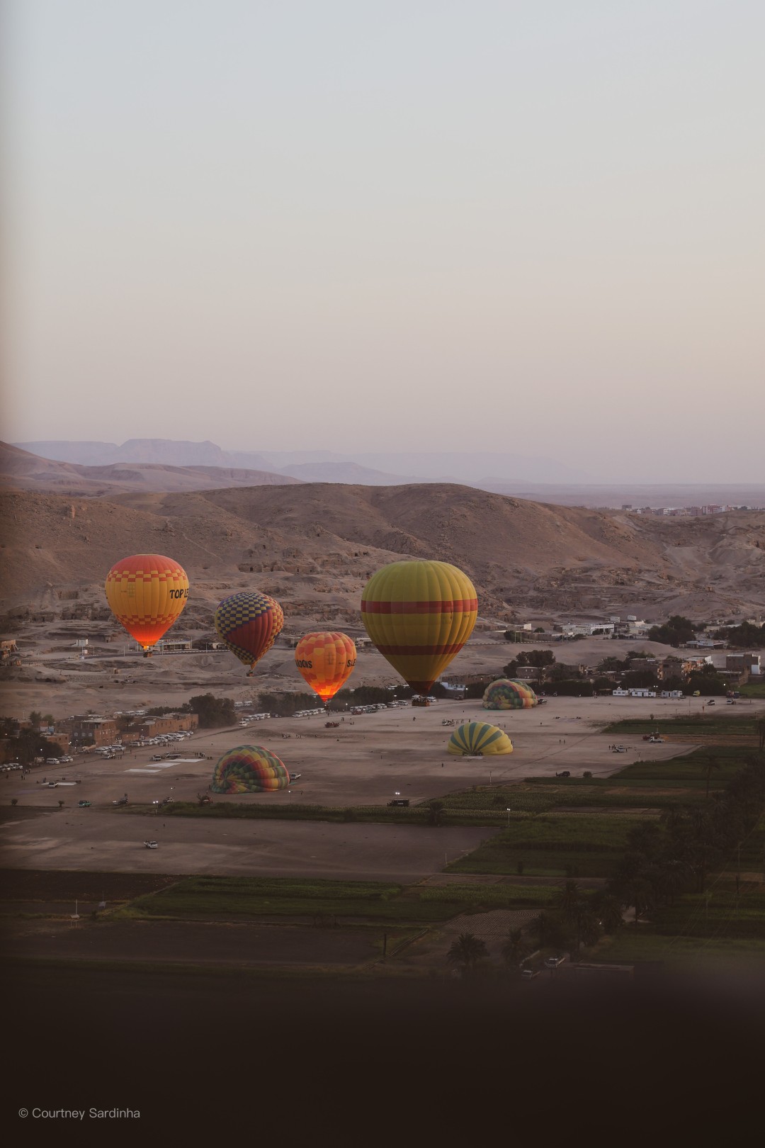 Aerial view of multiple hot air balloons over the Luxor landscape, Egypt