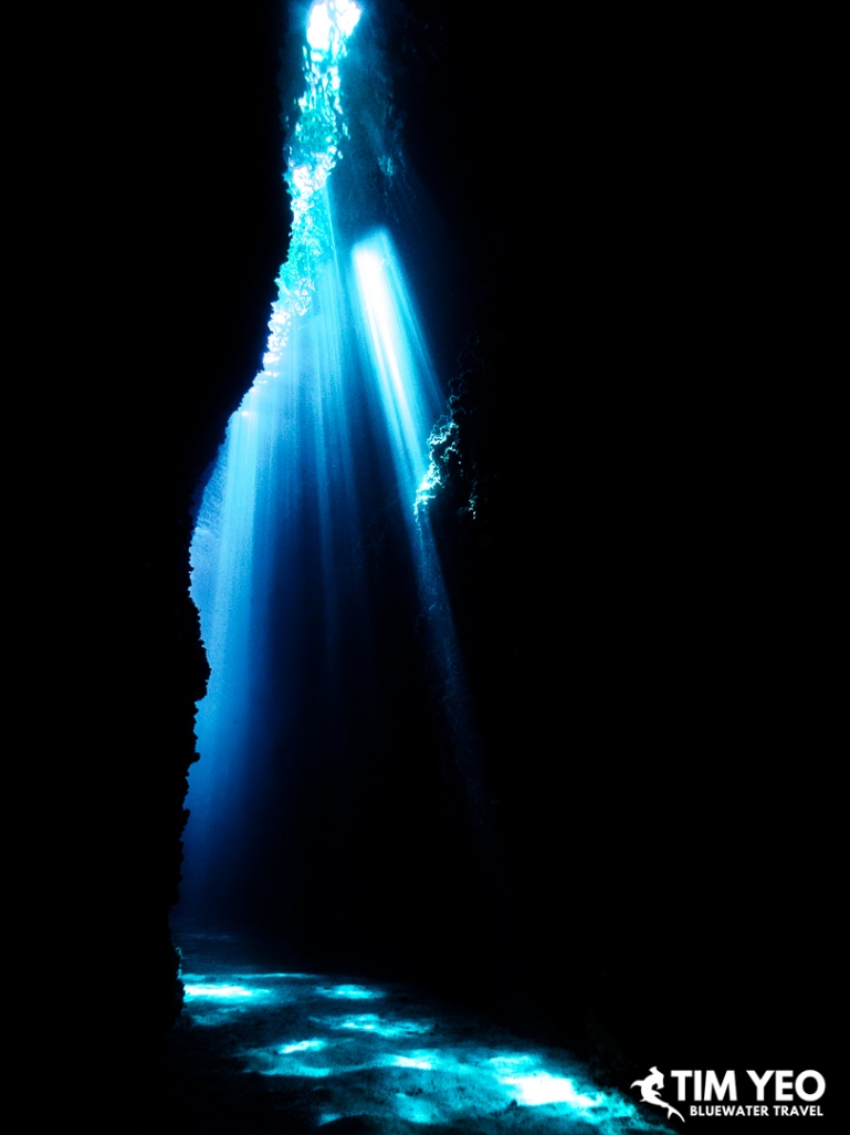 Sunlight beams streaming into the narrow passage of Leru Cut