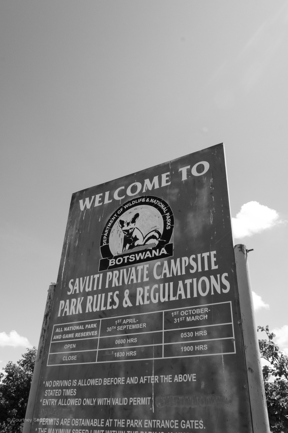 "Welcome to Savuti" park rules and regulations sign, Botswana