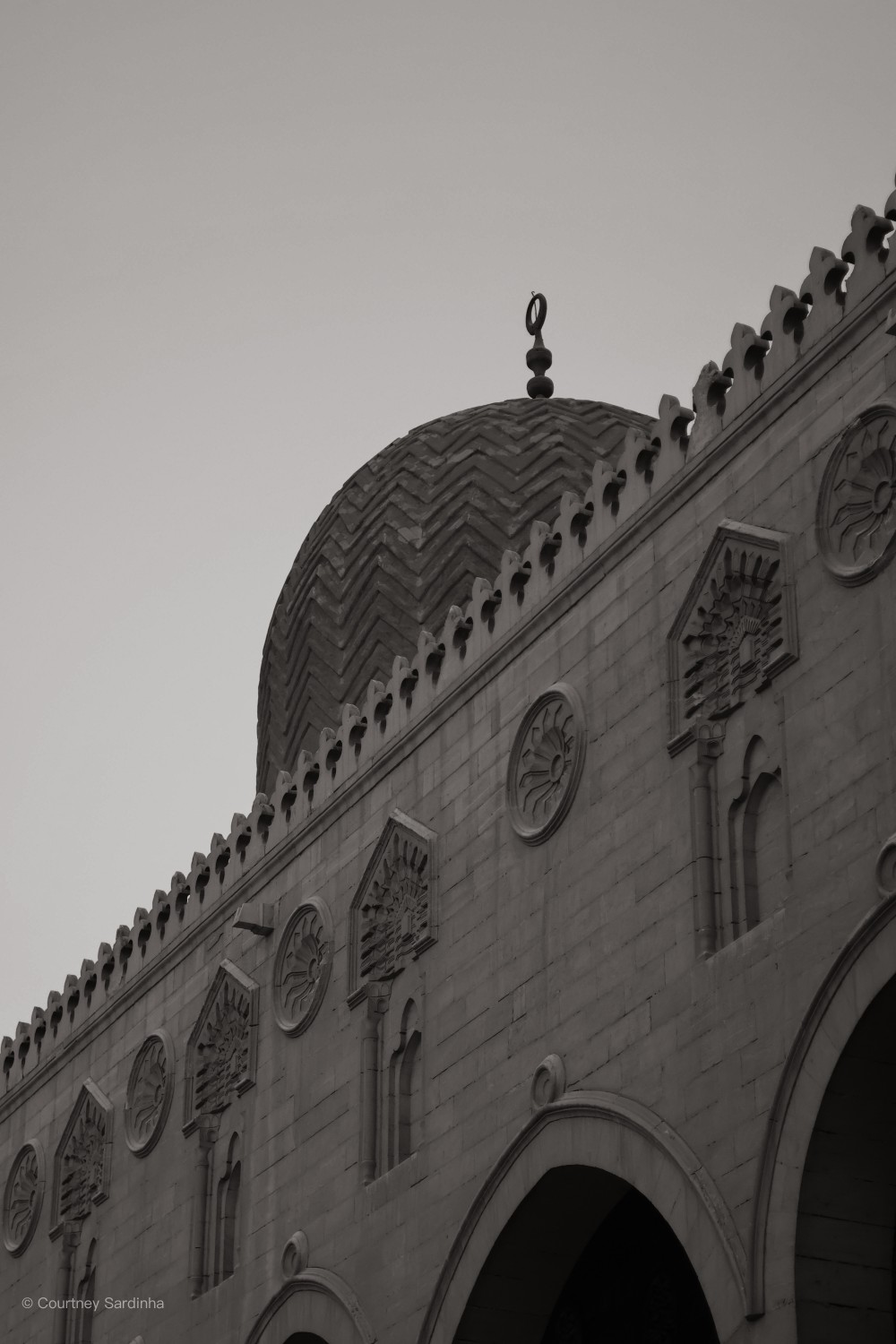 9:39 AMClaude responded: Mosque dome and carved stone facade, Cairo, Egypt — photo by Courtney SardinhaMosque dome and carved stone facade, Cairo, Egypt