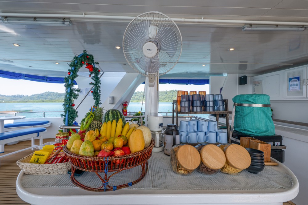 Dining area at the main deck of Manta Queen 3 liveaboard