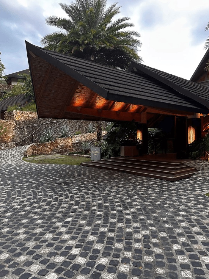Manami Resort entrance and tropical grounds