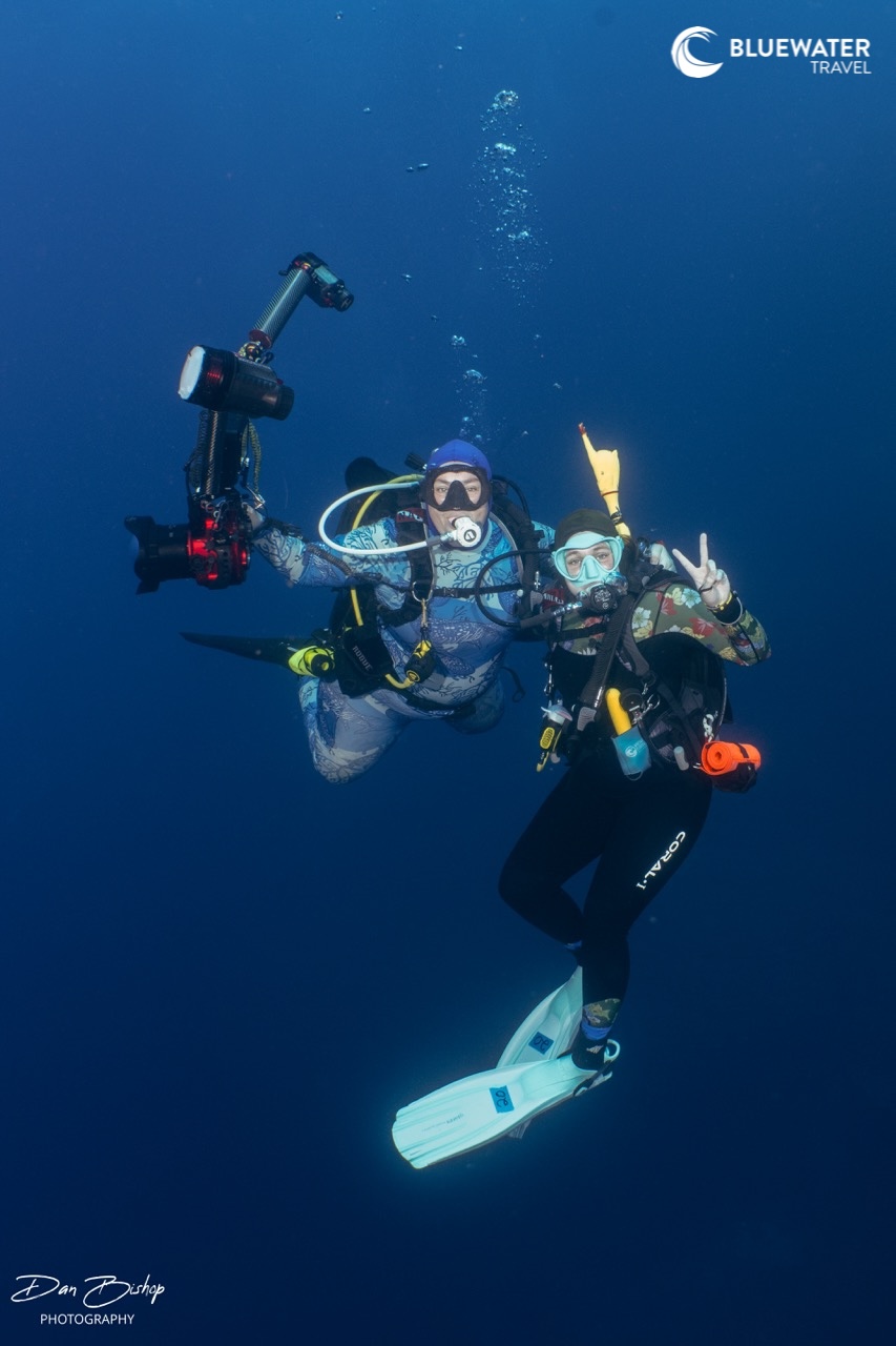 Happy divers pose for a photo