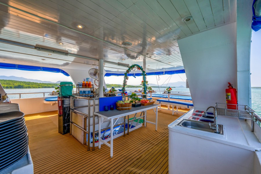 Dining area at the main deck of Manta Queen 3 liveaboard