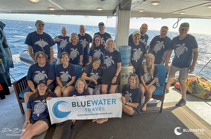 Happy Bluewater guests pose on the boat