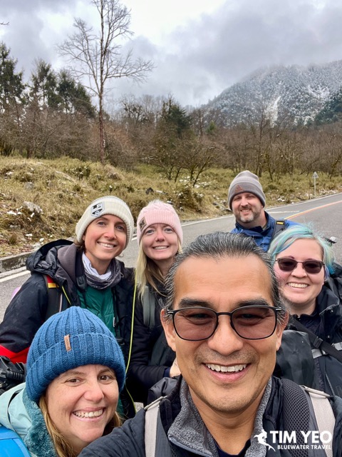 Happy guests take a selfie with nature