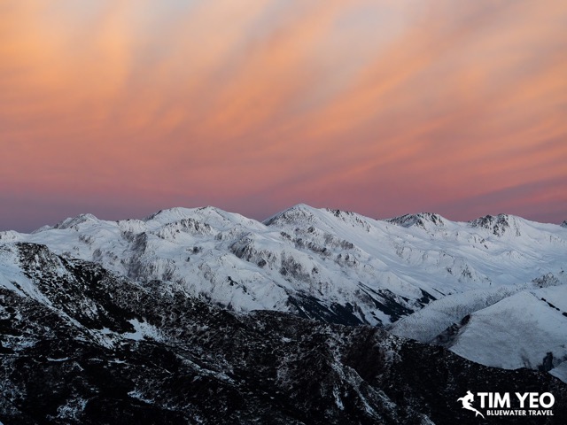 Beautiful sunset over snowy mountaintops