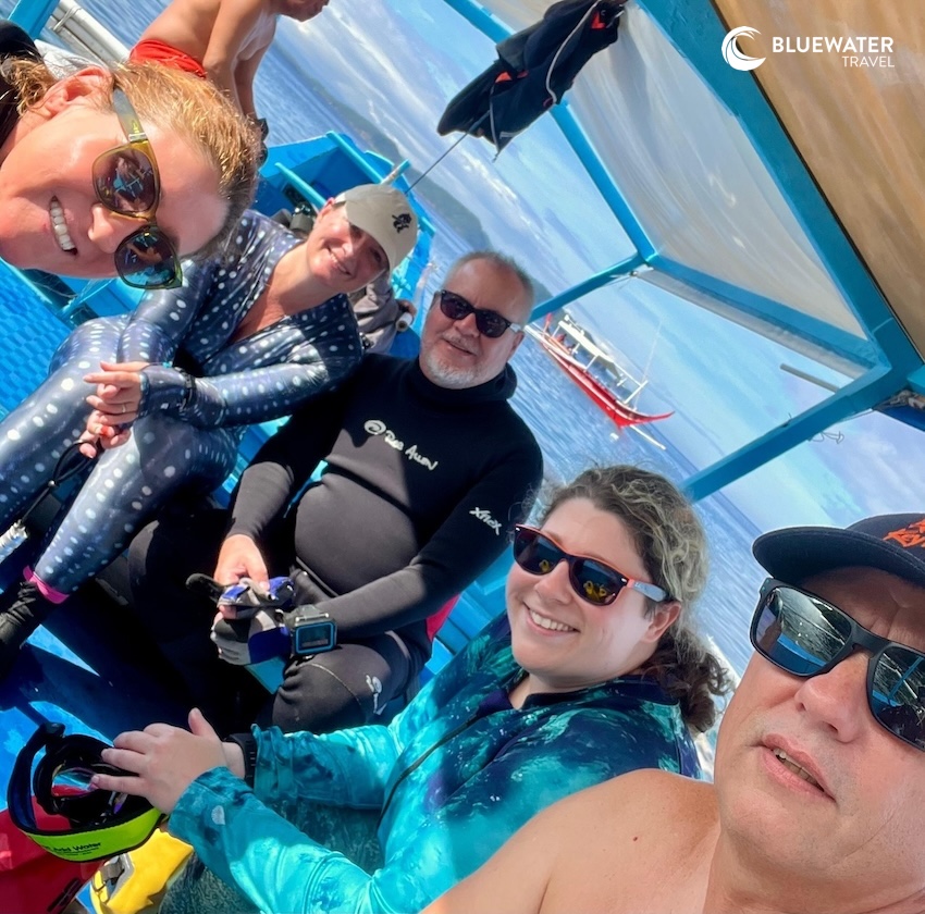Happy guests on the dive boat