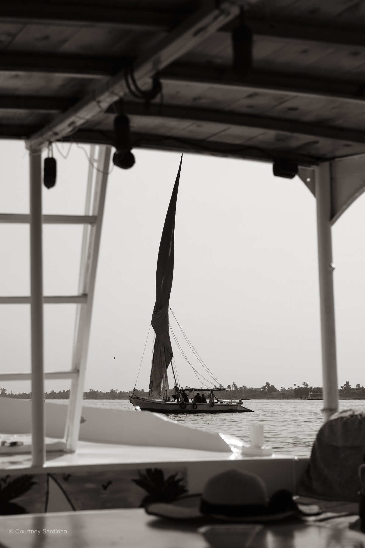 Felucca sailing boat on the Nile River at dusk, Luxor, Egypt