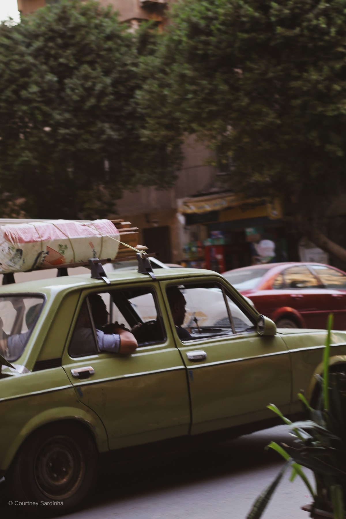 Vintage car in Cairo street traffic, Egypt