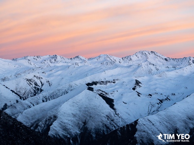 Beautiful sunset over snowy mountaintops